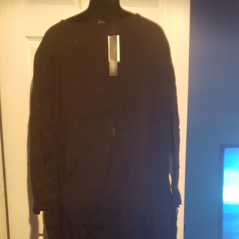 Long black gauze. Very boho. RUNS SMALL